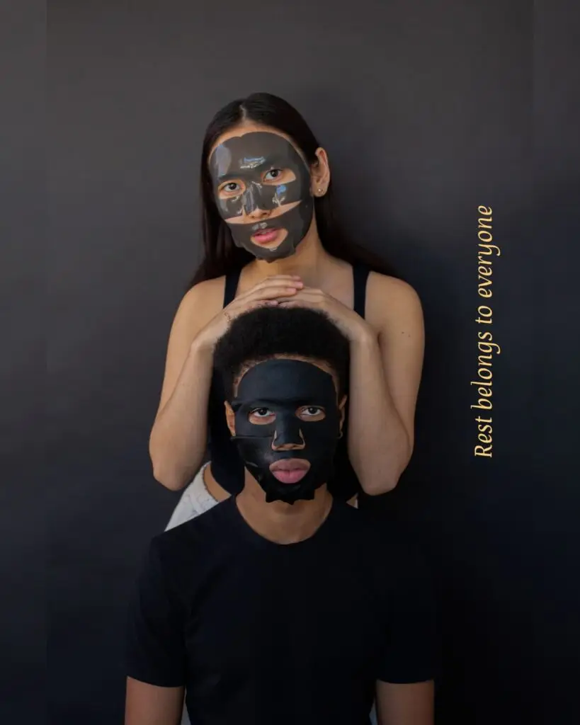 Asian woman and African man with face mask on in a quiet space